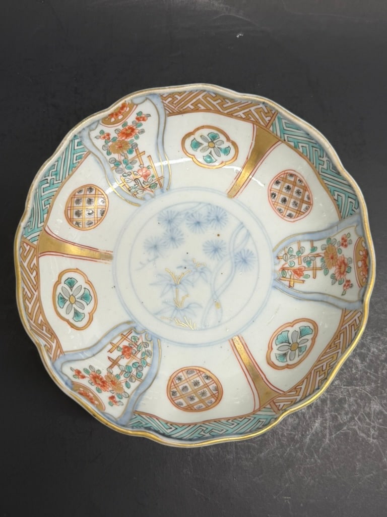 Japanese 19th Century Meiji Period Imari bowl Decorated with florals and geometric patterns: 19th Century Meiji Period Japanese Imari bowl Decorated with florals and geometric patterns 5 3/4'' by 1 7/8" deep
