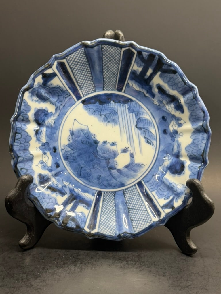 Japanese 19th century Bakumatsu periodÂ (Domestic use) Imari blue and white plate.: Late. Mid 19th century Bakumatsu period (Domestic use) Imari blue and white plate. 7 1/4'' in diameter by 1 1/4" deep. To get a quote on shipping, please contact Our 3rd party shipping partner: