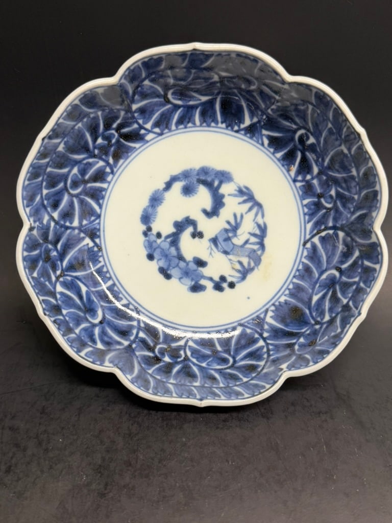 Japanese Meiji Period Imari Blue and White Namasu Bowl: 19th Century Japanese Imari Blue and White Namasu Bowl decorated with the three friends of winter in the center, and the octopus tentacle / Karakusa pattern border. Chenghua mark 5 5/8" by 1 3/4" deep