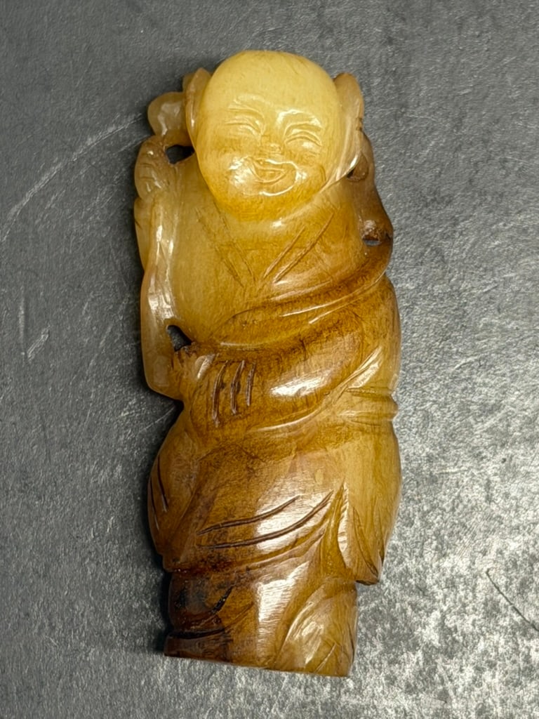 Chinese Qing dynasty Russet Jade Figural carving of a boy 19th century.: Chinese 19th Century Qing dynasty Russet Jade Figural carving of a boy 2 1/2'' tall by 1 1/8" wide