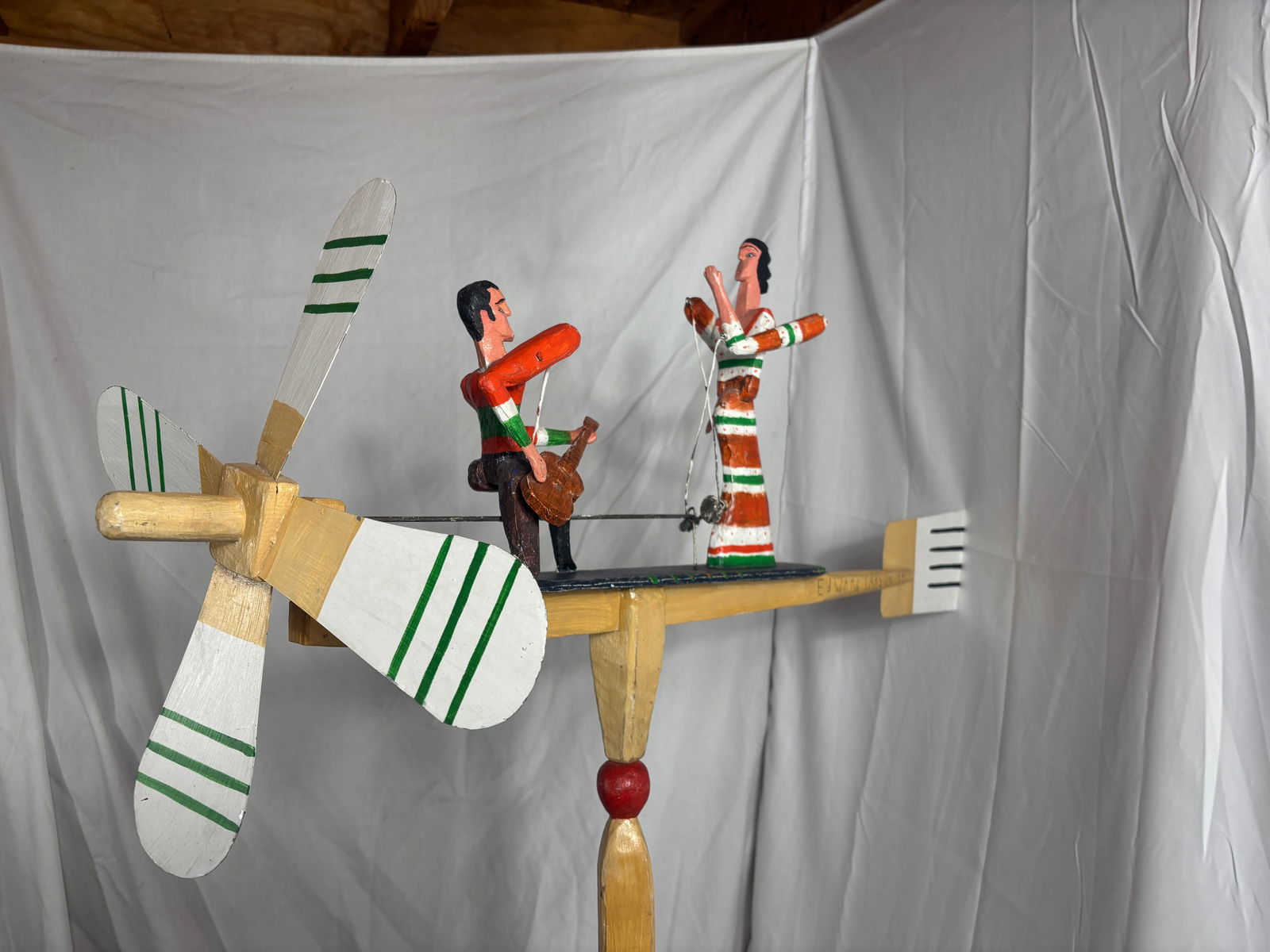 Whirligig - Sculpture 1991, Ed Larson: Ed Larson, b. 1931 Ed Larson is a Santa Fe folk artist known for his whimsical, Southwest-inspired creations. A jovial and beloved presence in Santa Fe’s vibrant art community, Larson has spent