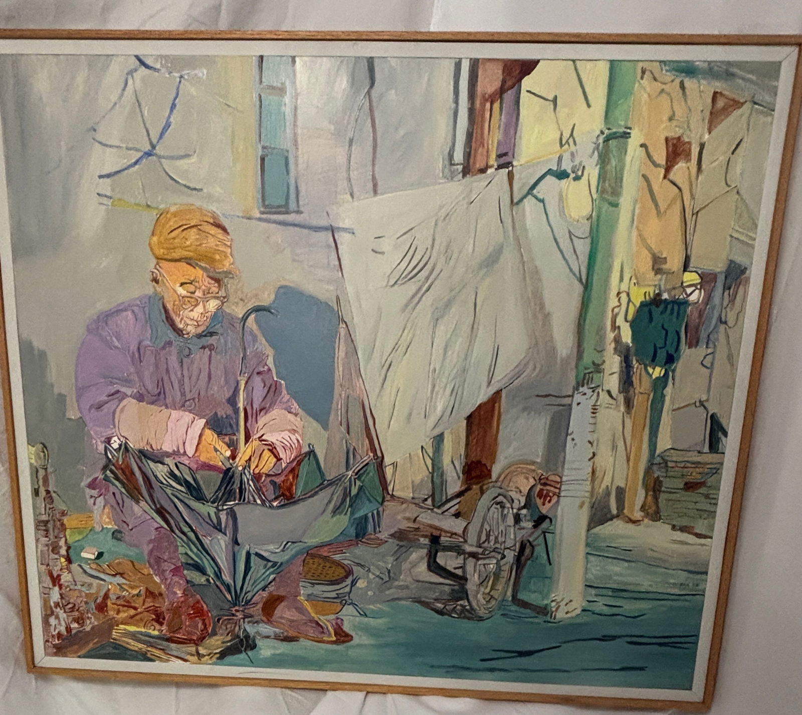 "Umbrella Repairman", original 1981, Phyllis Seltzer: Phyllis Seltzer (1925–2023) Original oil on canvas. Born in Detroit and raised in Cleveland from age three, Seltzer earned her BFA and MFA from the University of Iowa, studying printmaking under