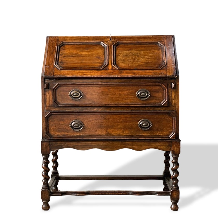 LATE 19TH CENTURY BRITISH BAROQUE STYLE WRITING DESK: Dimensions: 74x42x97cm (29 1/8 x 16 1/2 x 38 1/4 inches). Made around 1880, crafted from oak with internal letter racks and drawers. In excellent condition with normal signs of age.