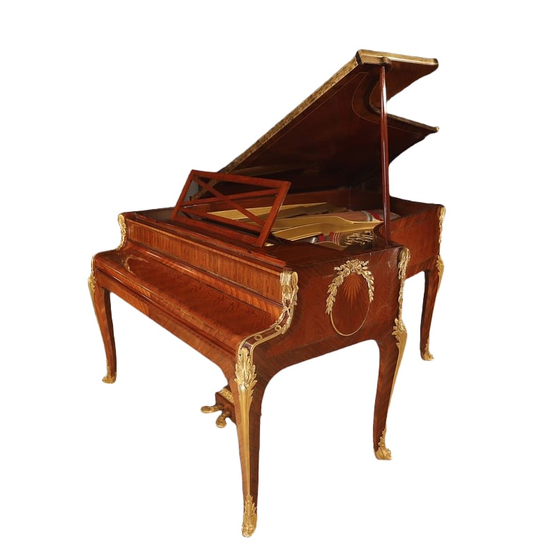 19TH CENTURY FRENCH PLEYEL LOUIS XV STYLE GILT-BRONZE MOUNTED GRAND PIANO: A 19th century French Pleyel grand piano, decorated in the Louis XV style with gilt-bronze mounts and marquetry veneers. The case features walnut and kingwood parquetry with decorative gilt-bronze orn