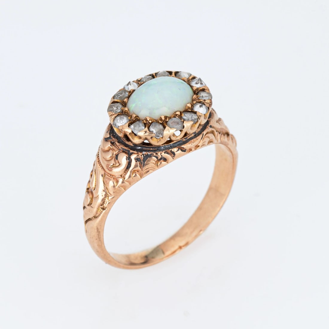 ANTIQUE VICTORIAN OPAL DIAMOND RING 14K YELLOW GOLD SZ 5.75 FINE VINTAGE JEWELRY: ANTIQUE VICTORIAN OPAL DIAMOND RING 14K YELLOW GOLD SZ 5.75 FINE VINTAGE JEWELRY Description: One opal measures 7mm x 5mm, accented with 14 estimated 0.02 carat old rose cut diamonds. The total diamon