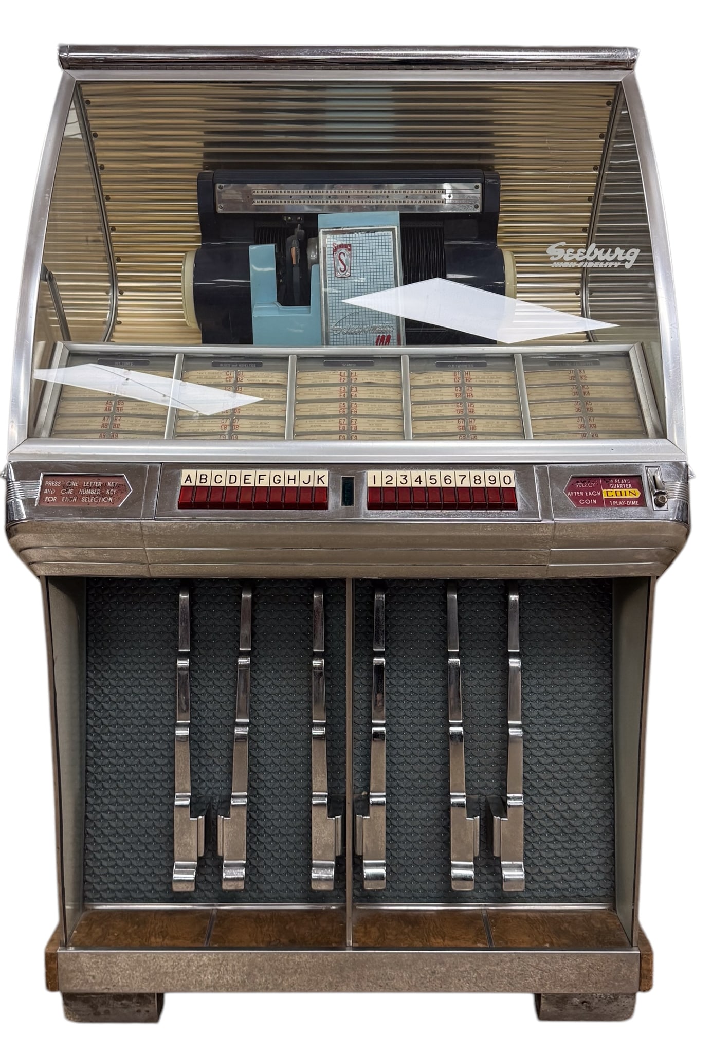 Seeburg Select-O-Matic 100 Model HF100R Jukebox: Vintage Seeburg Select-O-Matic 100 Model HF100R jukebox, serial number 262633. This High Fidelity jukebox held 50 records for 100 total songs. The records were 45 RPM. This unit look like there are al