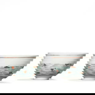 QING DYNASTY, A CHINESE WUCAI CUP WITH "FALLING FLOWERS ON FLOWING WATER" MOTIF, MARKED "JIAQING: QING DYNASTY, A CHINESE WUCAI CUP WITH "FALLING FLOWERS ON FLOWING WATER" MOTIF, MARKED "JIAQING NIAN ZHI," QING DYNASTY, EARLY 19TH CENTURY. Height: 1 9/16 in. (4.0 cm), Diameter: 2 1/2 in. (6.3 cm)