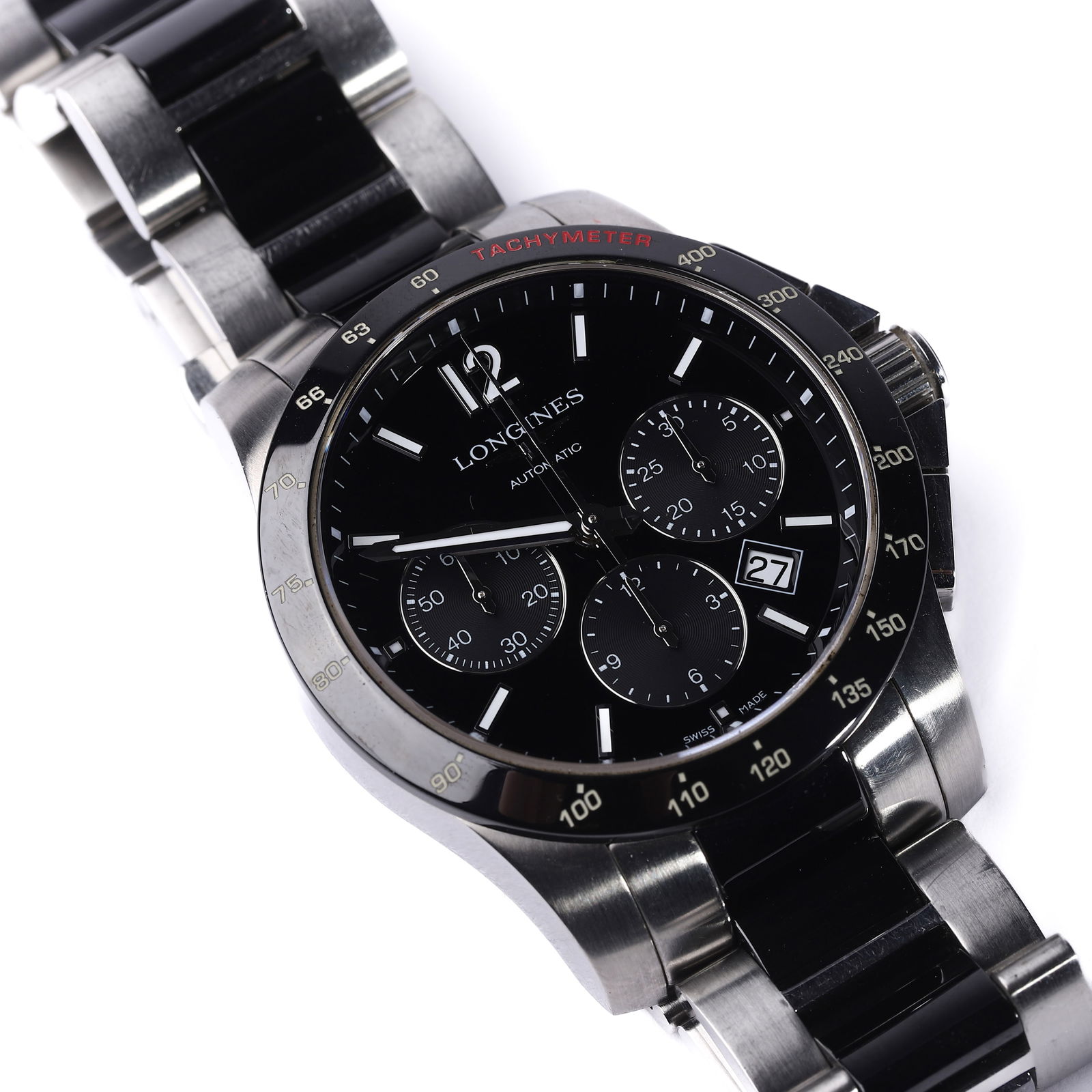 LONGINES CONQUEST STAINLESS STEEL CHRONOGRAPH WRISTWATCH: Dimensions: Dial diameter: 1 13/16 in. (46.7 mm) Description: This robust Longines Conquest wristwatch features a bold stainless steel case and bracelet, housing an automatic chronograph movement visi