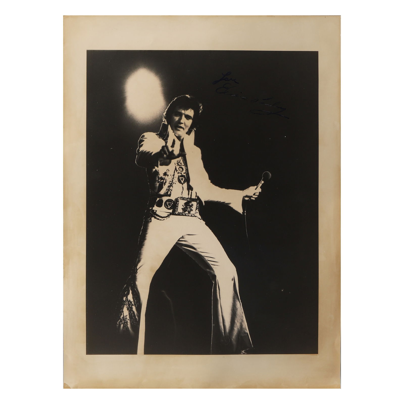 ELVIS PRESLEY (1935–1977) SIGNED PERFORMANCE PHOTOGRAPH, CIRCA 1970S (1 of 1)