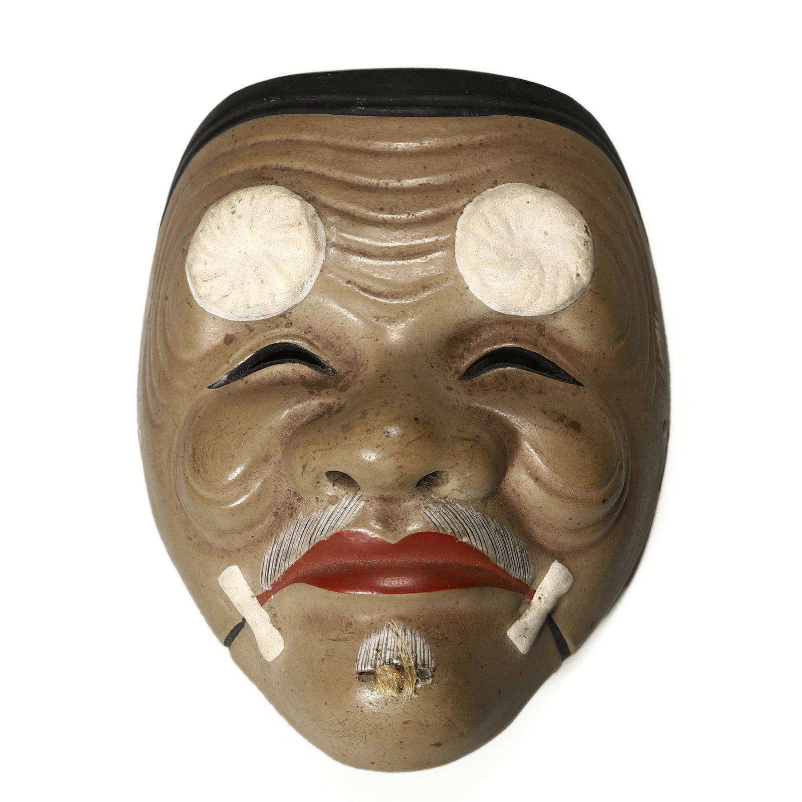 JAPANESE EROTIC DOUBLE-SIDED MASK: Dimensions: Length: 3 15/16 in. (10 cm), Width: 2 15/16 in. (7.5 cm) Description: A finely carved Japanese double-sided mask featuring a jovial elderly male face on the front, characterized by deeply 
