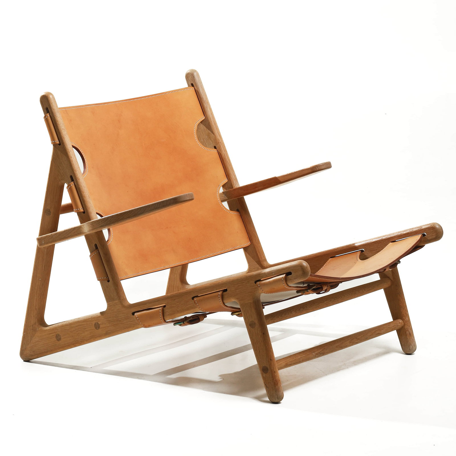 BØRGE MOGENSEN FOR FREDERICIA MODEL 2229 SLING CHAIR: Dimensions 35 7/16 × 23 1/4 × 26 3/8 in (90 × 59 × 67 cm) Description Designed by Børge Mogensen for Fredericia, this Model 2229 sling chair features a solid oak A-frame structure with natural sa