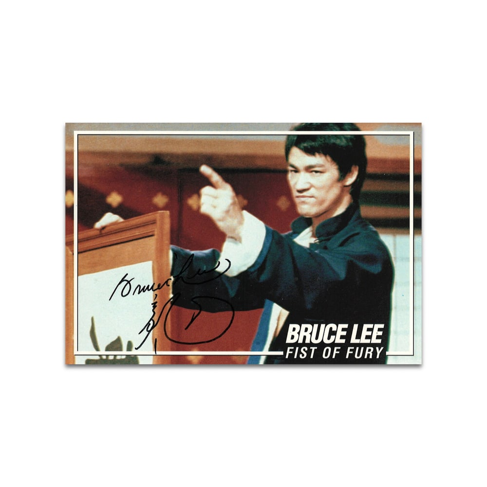 BRUCE LEE SIGNED FIST OF FURY POSTCARD: 6 1/8 x 4 1/8 in (15.5 x 10.5 cm) This signed Fist of Fury postcard represents a powerful artifact from one of the most influential moments in global cinema history. Bruce Lee stands as a