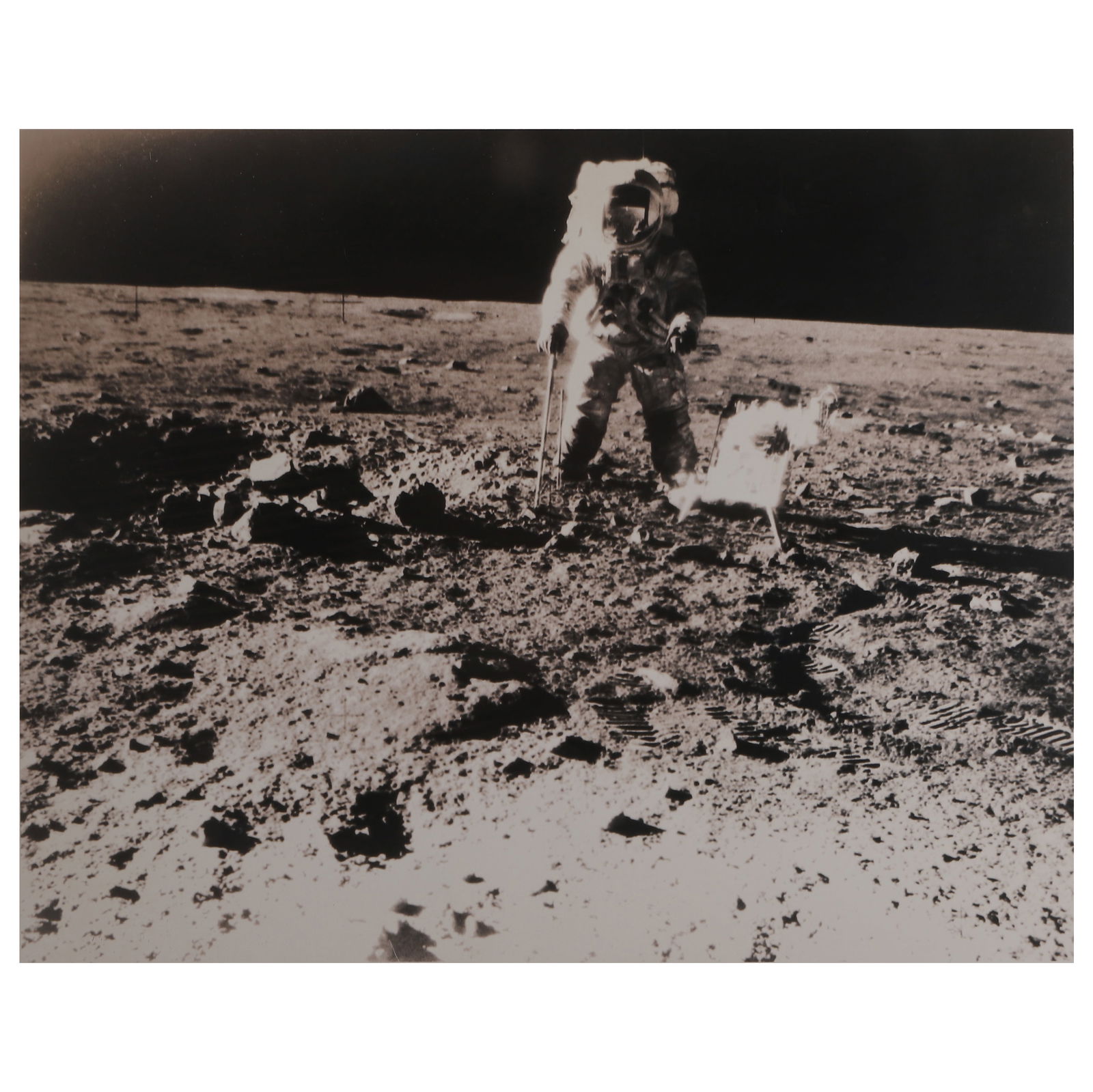 NASA, ASTRONAUT CHARLES “PETE" CONRAD COLLECTING LUNAR SAMPLES ON THE MOON, 1969 (1 of 2)