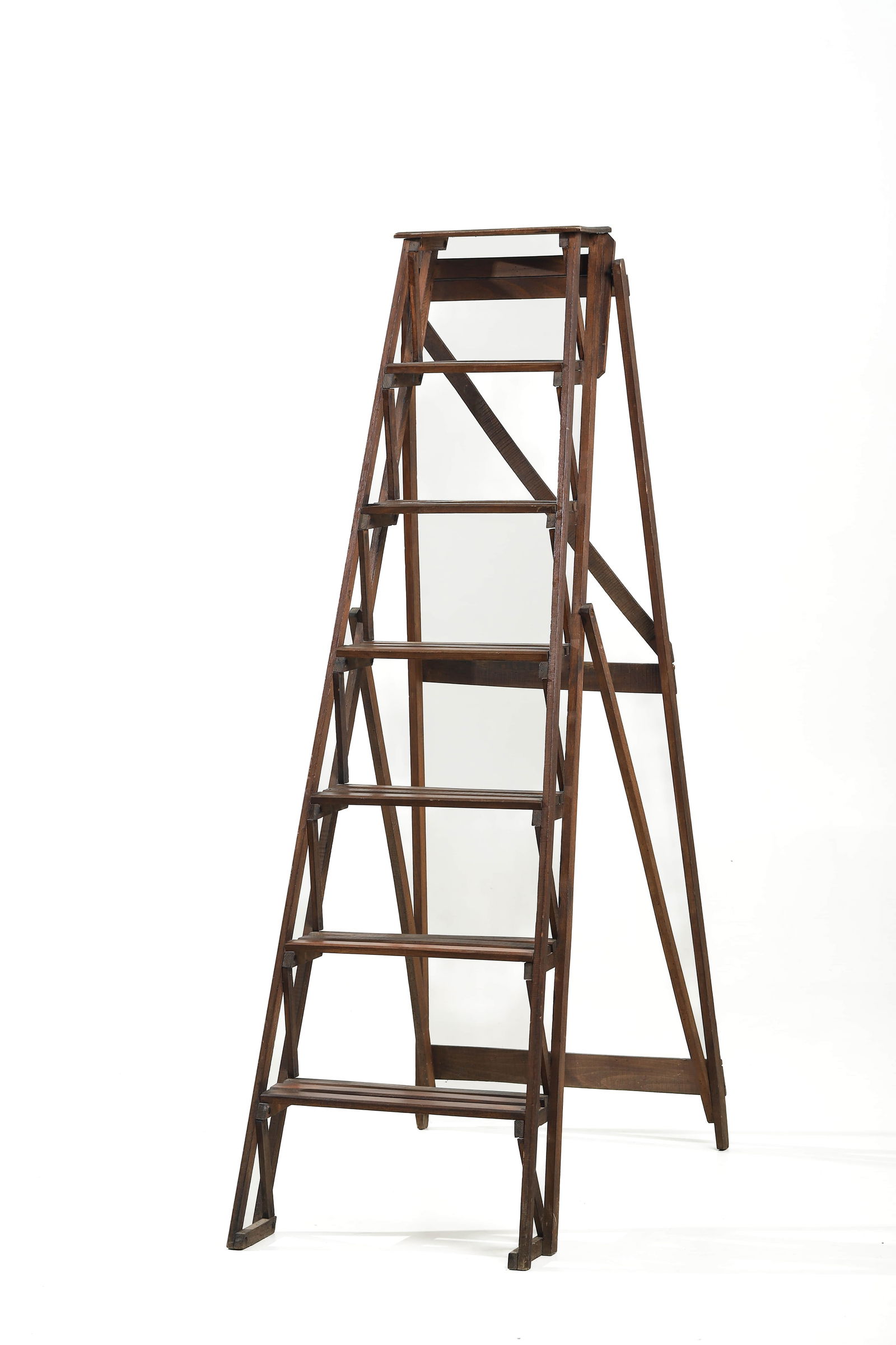 ANTIQUE WOODEN FOLDING LADDER: Dimensions 69 5/16 × 22 7/16 in (176 × 57 cm) Description This antique wooden folding ladder features a traditional A-frame construction with multiple wide steps supported by cross-braced struts