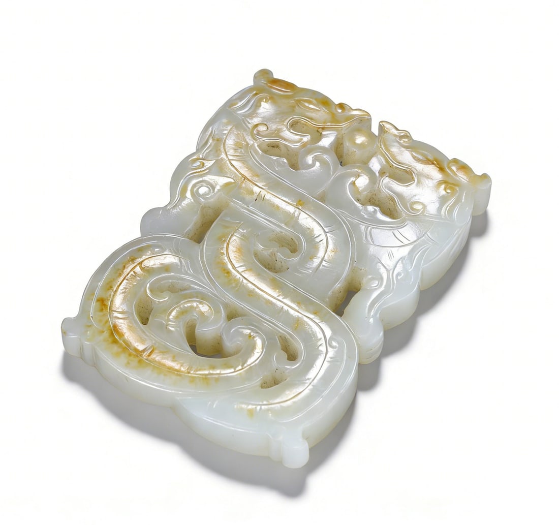 A Fine Ming White Jade Pendant with Russet Skin Carving of Two Interlocking Chilong Dragons (1 of 8)