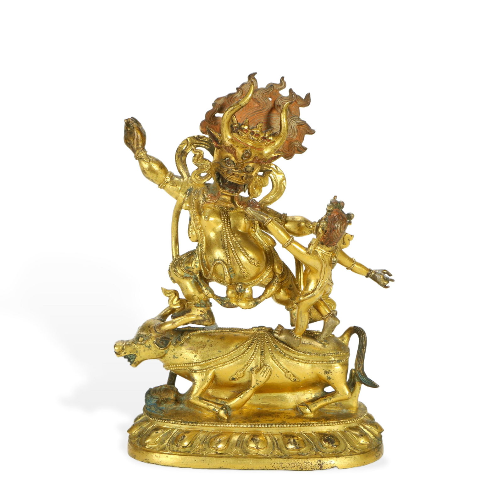 Gilt - bronze Figure of Yamantaka: H:18.5cm W:12.5cm This is a gilt - bronze figure of Yamantaka. The statue presents the mighty image of Yamantaka, adorned with gorgeous garlands, etc., standing on a bull, with a vigorous posture