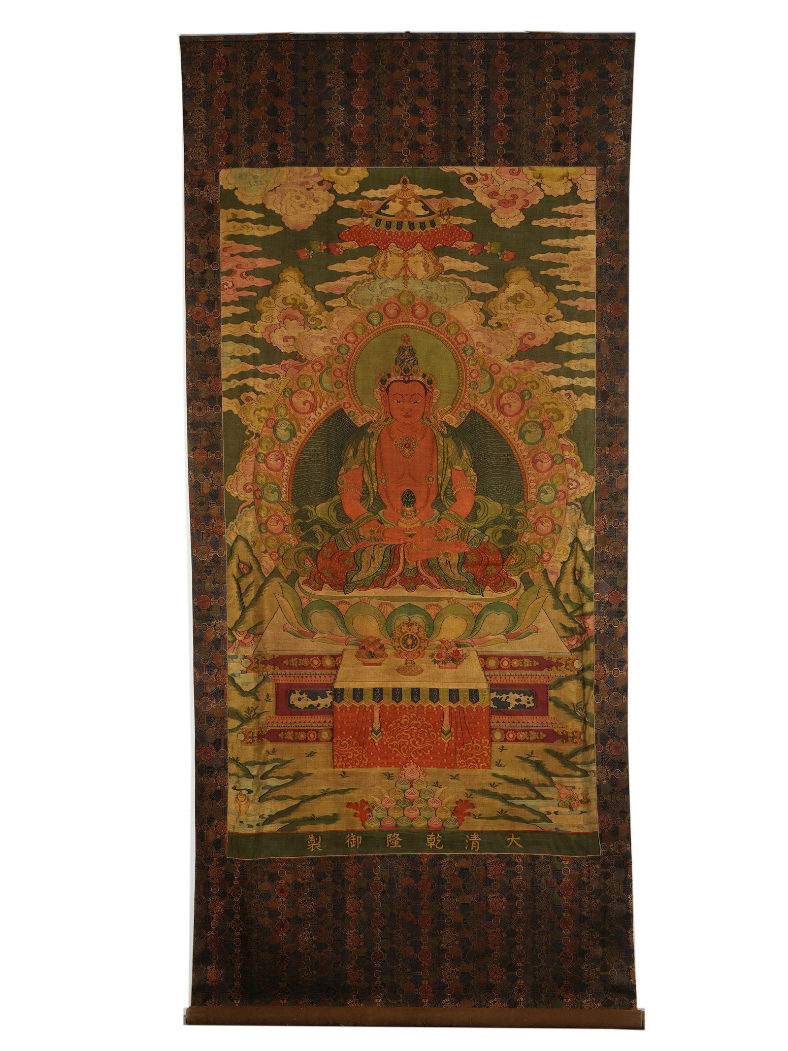 Qing Qianlong Imperial Kesi Buddha Statue Vertical Scroll: L:169cm W:90cm This Qing Qianlong imperial kesi Buddha statue vertical scroll is made with exquisite kesi technique. The Buddha statue in the picture has a solemn shape, wearing gorgeous clothes. The