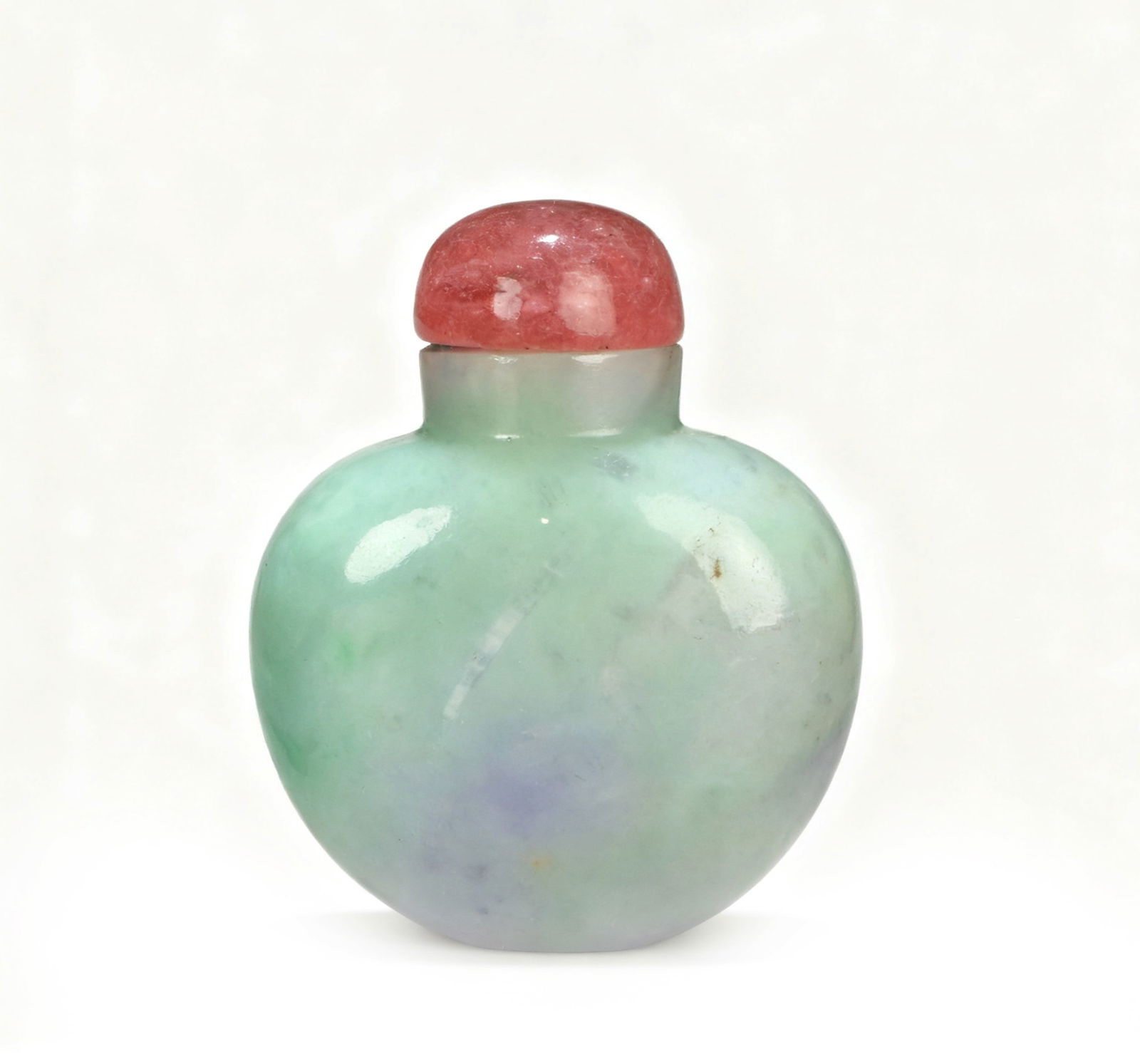 Jadeite Plain Snuff Bottle (with Ruby Lid): H:6cm W:4.5cm This is a jadeite plain snuff bottle with a ruby lid. The jadeite has a warm texture and a light and soft color, showing the beauty of green, purple and other colors blending with each o