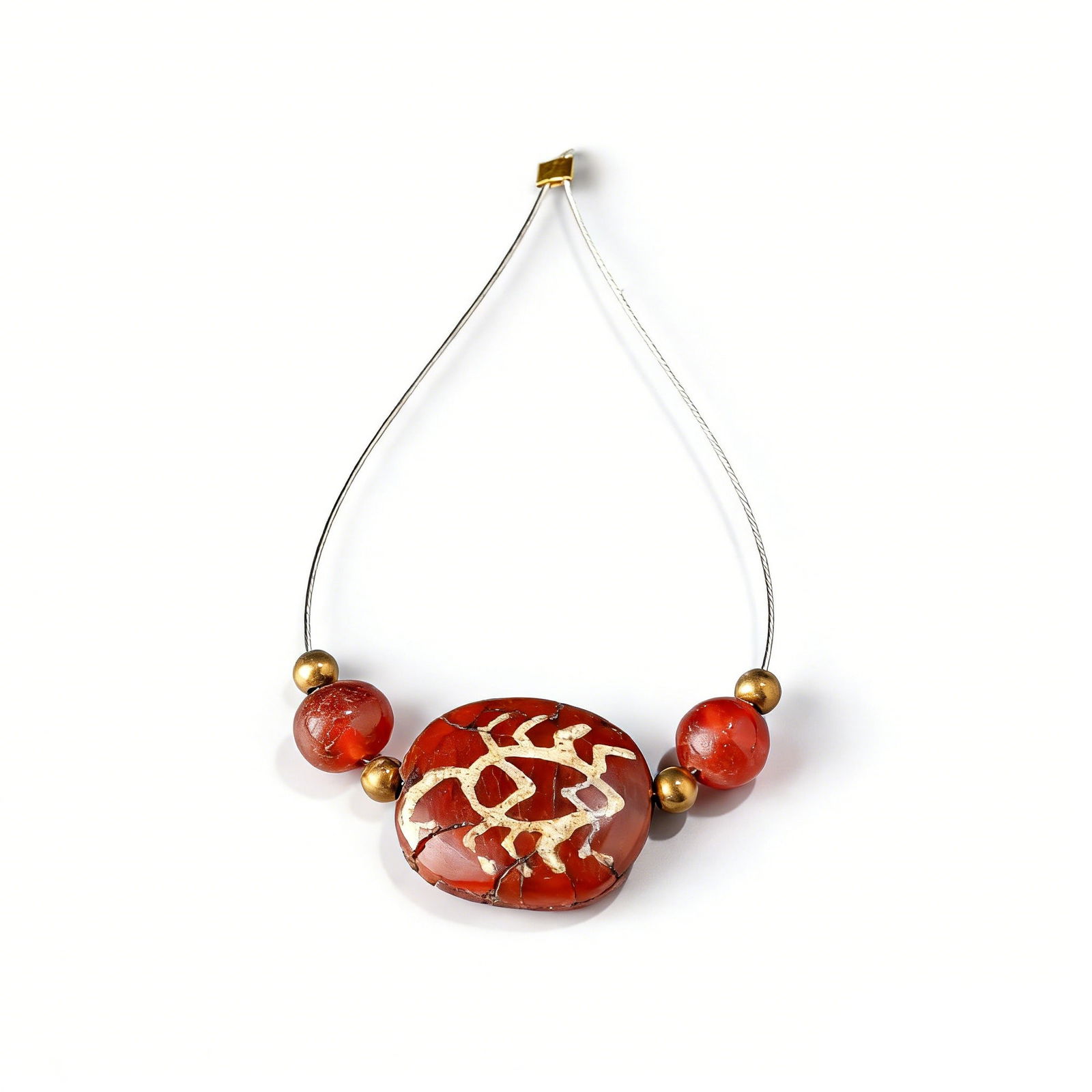 Burmese Pyu Bagan Etched Carnelian Agate Bead with Scorpion Motif & Small Carnelian Beads: A rare etched carnelian agate bead from the Pyu Bagan culture of Burma (Southeast Asia), featuring a distinct scorpion motif. Accompanied by a group of small carnelian beads.