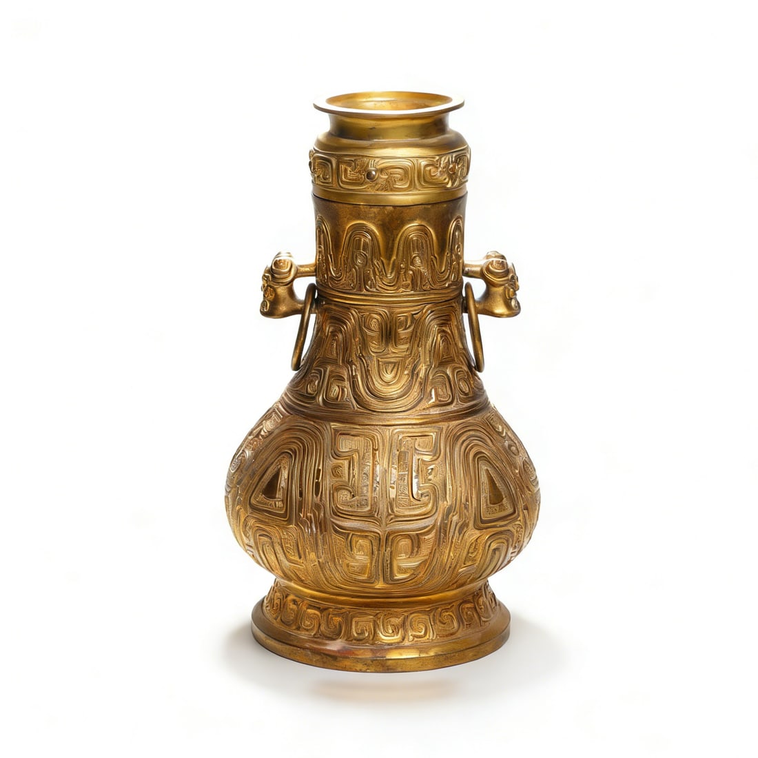 Qing Qianlong Period Gilt-Bronze Archaistic Vase with Taotie Pattern and Double Handles: H?33.5cm W:20cm This Qing Qianlong Period Gilt-Bronze Archaistic Vase with Taotie Pattern and Double Handles is a fine imperial archaistic bronze piece of the Qianlong reign of the Qing Dynasty.Fully