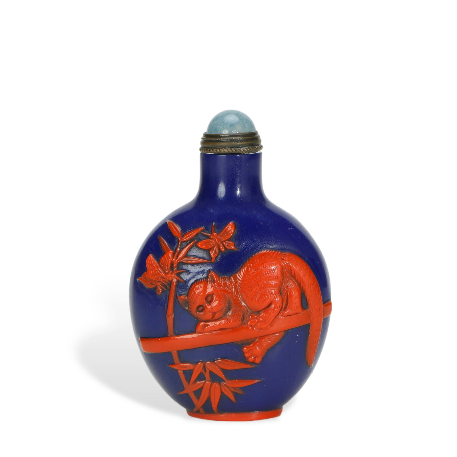 Blue - ground Overlay Red Glass Snuff Bottle with Cat and Butterfly Patterns: H:7cm W:4.5cm This blue - ground overlay red glass snuff bottle with cat and butterfly patterns is made by overlay glass technique, with blue glass as the ground and red glass carved with patterns.