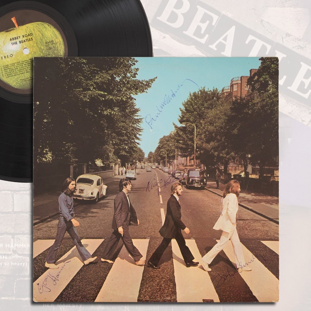 THE BEATLES FULLY SIGNED ABBEY ROAD LP: 12 1/4 x 12 1/4 Provenance and Authentication: This collectible has undergone a rigorous forensic evaluation. The signatures were carefully analyzed across multiple criteria, including ink deposition,
