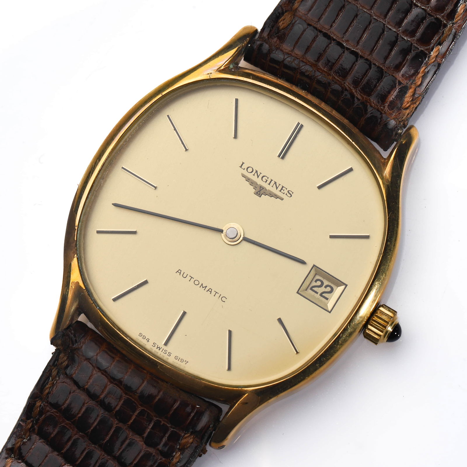 LONGINES GOLD-TONE AUTOMATIC DATE WRISTWATCH: Dimensions Case diameter: 1 13/32 in. (35.6 mm); overall length approx. 8 21/32 in. (22 cm). Description A refined Longines automatic wristwatch featuring a champagne-toned dial signed Longines Automa