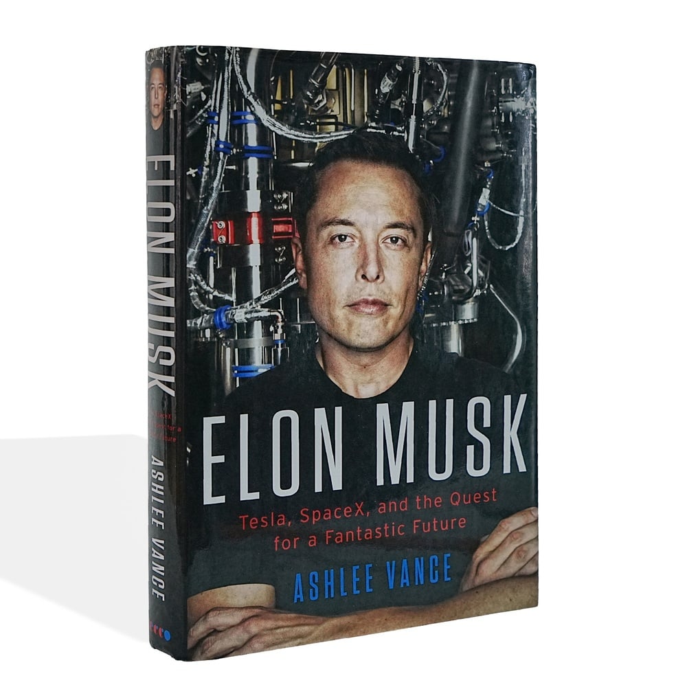 ELON MUSK SIGNED ELON MUSK: TESLA, SPACEX, AND THE QUEST FOR A FANTASTIC FUTURE: 9 1/4 x 6 1/4 in (23.5 x 16 cm) Provenance and Authentication: This collectible has undergone a rigorous forensic evaluation. The signatures were carefully analyzed across multiple criteria,