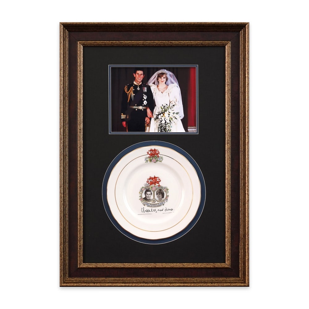 CHARLES & DIANA SIGNED 1981 ROYAL WEDDING PLATE: Framed Dimensions: 23 x 16 1/2 in (58.5 x 42 cm) Provenance and Authentication: This collectible has undergone a rigorous forensic evaluation. The signatures were carefully analyzed across multiple