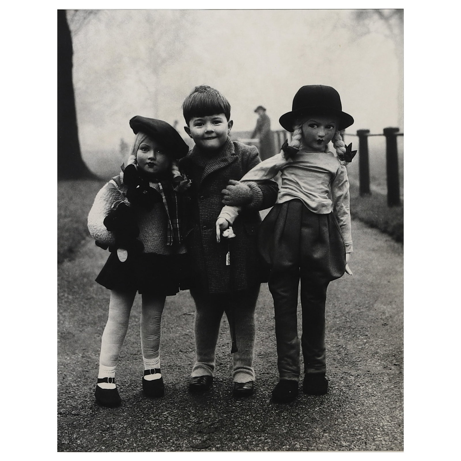 ELLIOTT ERWITT (1928–2023)YOUNG BOY & DOLLS: Artist ELLIOTT ERWITT (1928–2023) Title YOUNG BOY & DOLLS Medium Gelatin silver photograph, mounted on board Signature Signed in ink on the lower right of the photograph Dimensions Photograph: 10 9/