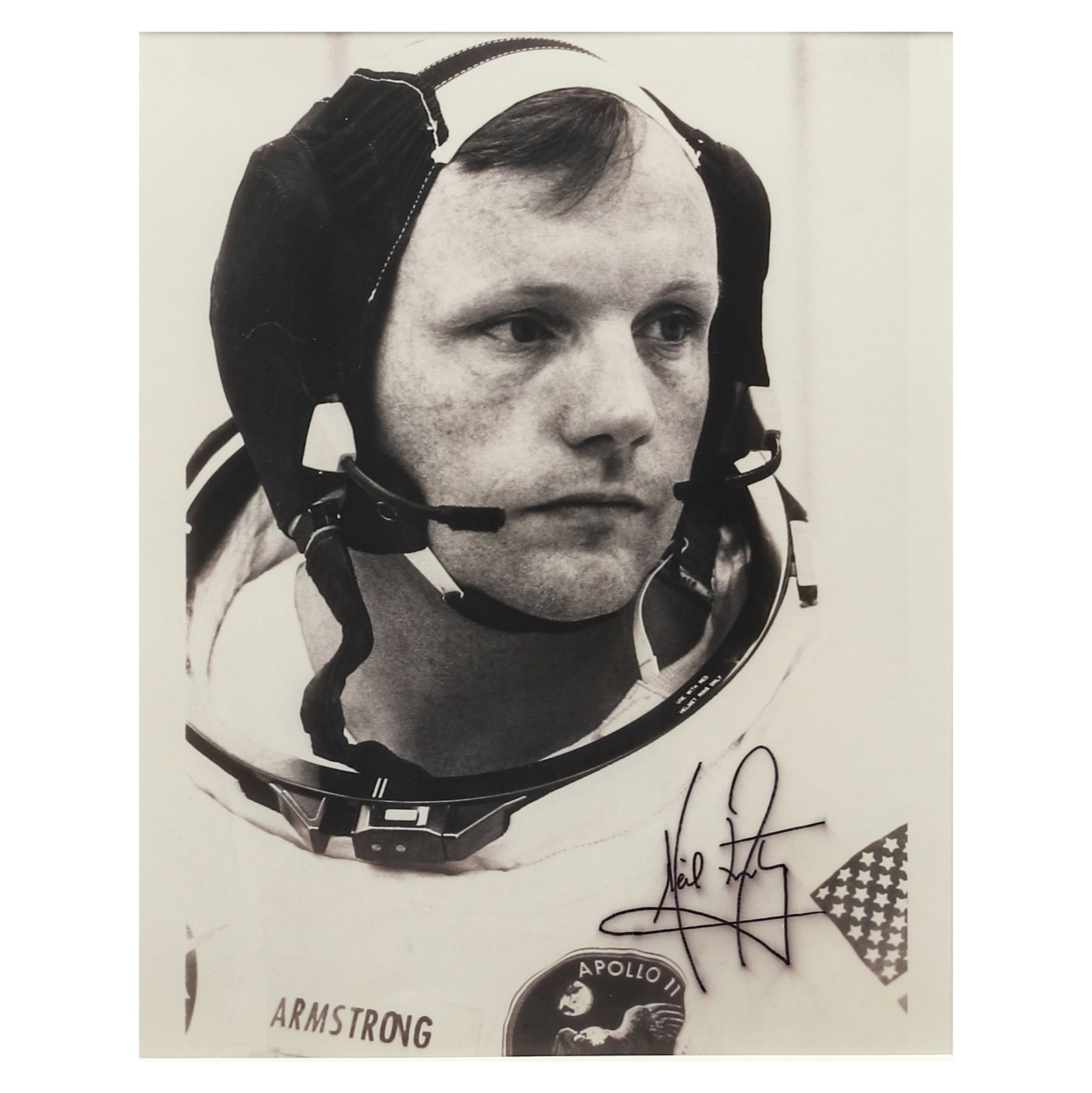 NEIL ARMSTRONG (1930–2012) PORTRAIT IN APOLLO 11 SPACESUIT, 1969: DescriptionTitle: Portrait of Neil ArmstrongPeriod: Circa 1969Materials: Gelatin silver printSignature: Signed by Neil Armstrong in ink at the lower rightSize: Image 8 3/4 × 6 1/8 in. (22.2 × 15.5