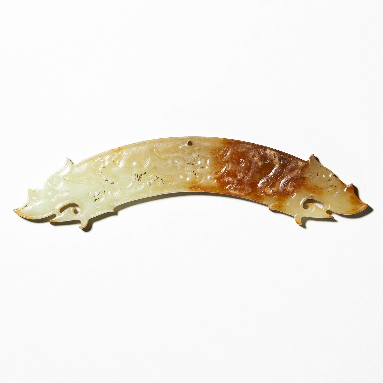 A JADE PENDANT (HUANG).: Length 5 1/2 in (14 cm)