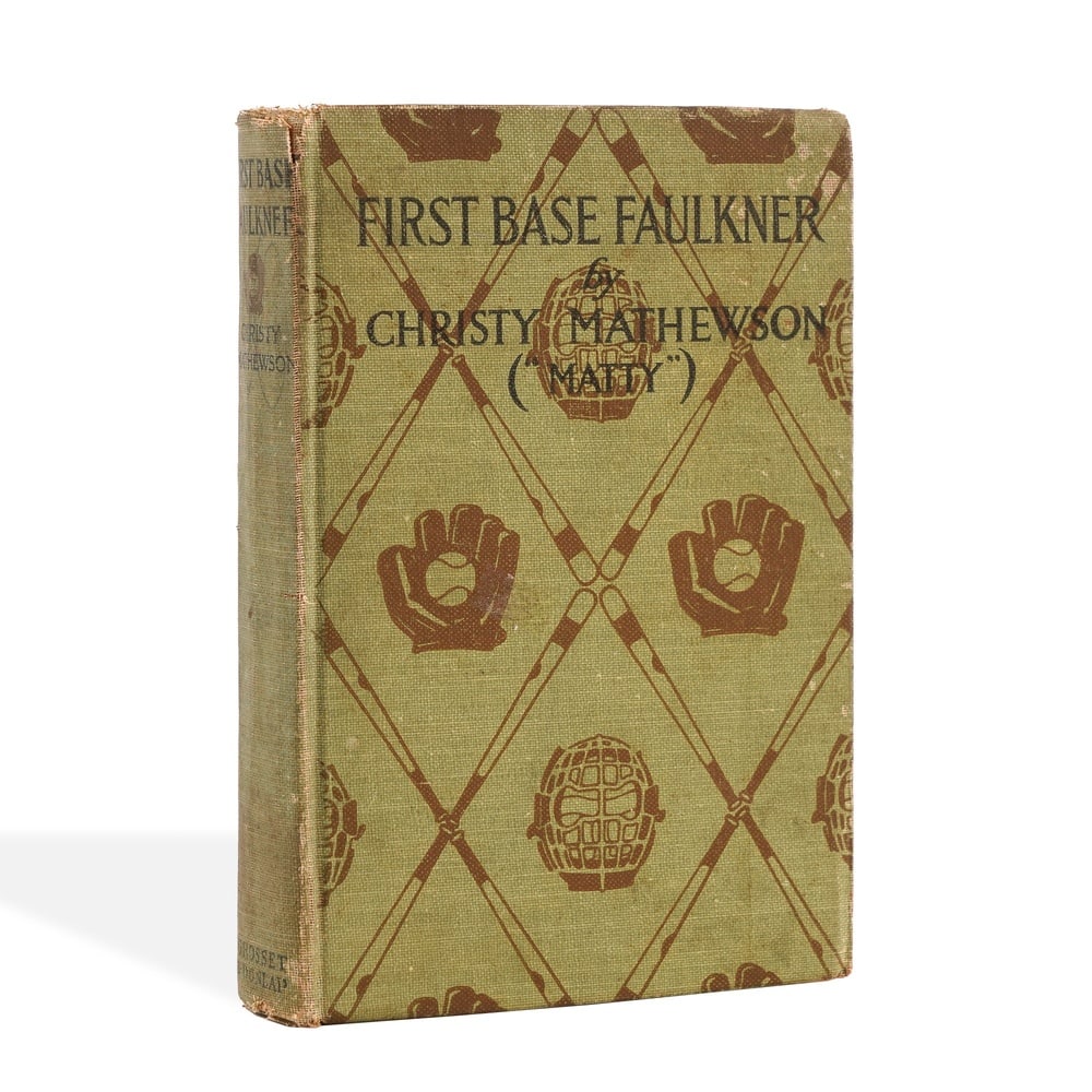 CHRISTY MATHEWSON BOOK - FIRST BASE FAULKNER: 7 1/2 x 5 1/8 in (19.2 x 13 cm) The surface presents visible handwritten markings. This copy of First Base Faulkner by Christy Mathewson represents a highly desirable example of early American