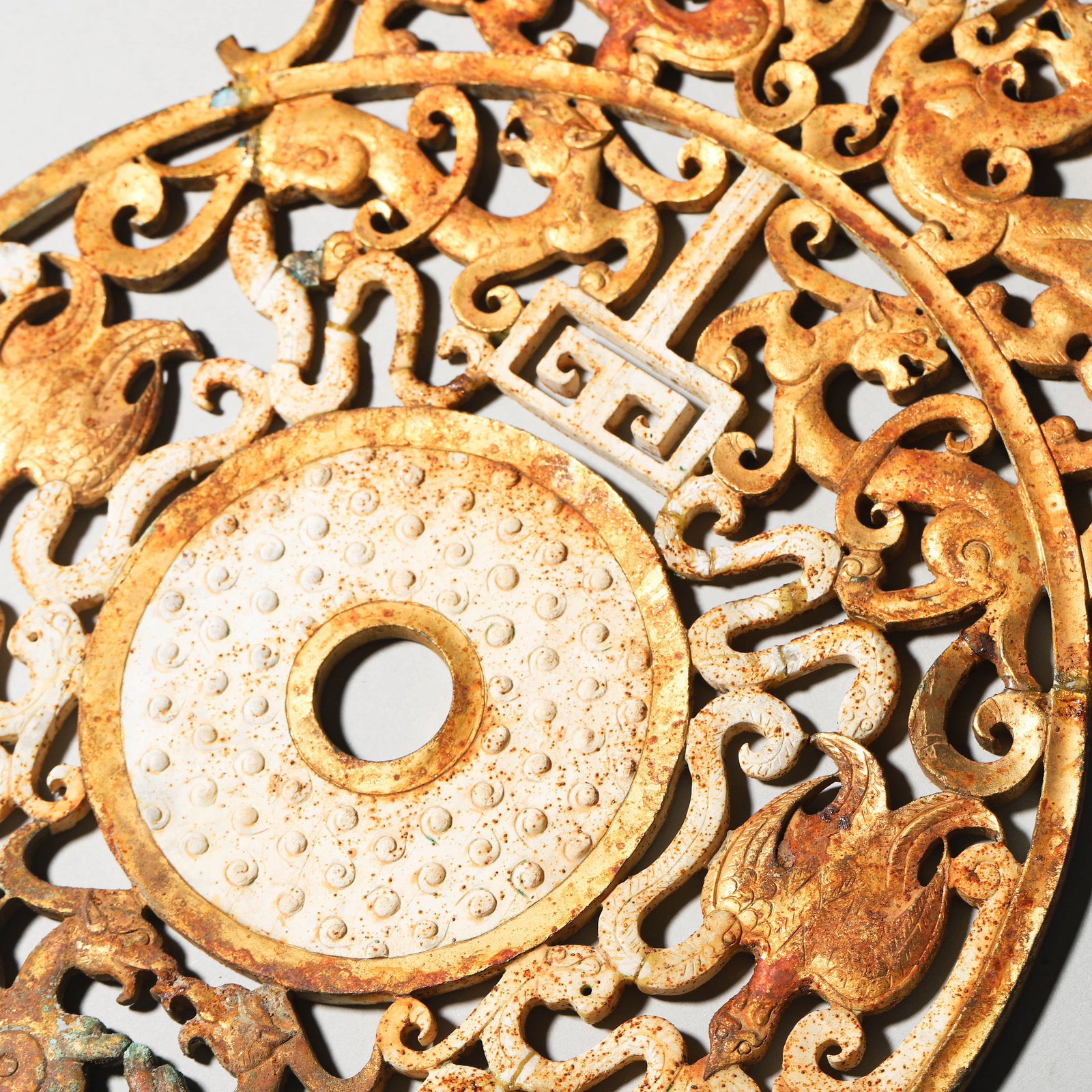 A JADE BI DISC WITH OPENWORK BORDER. - 6