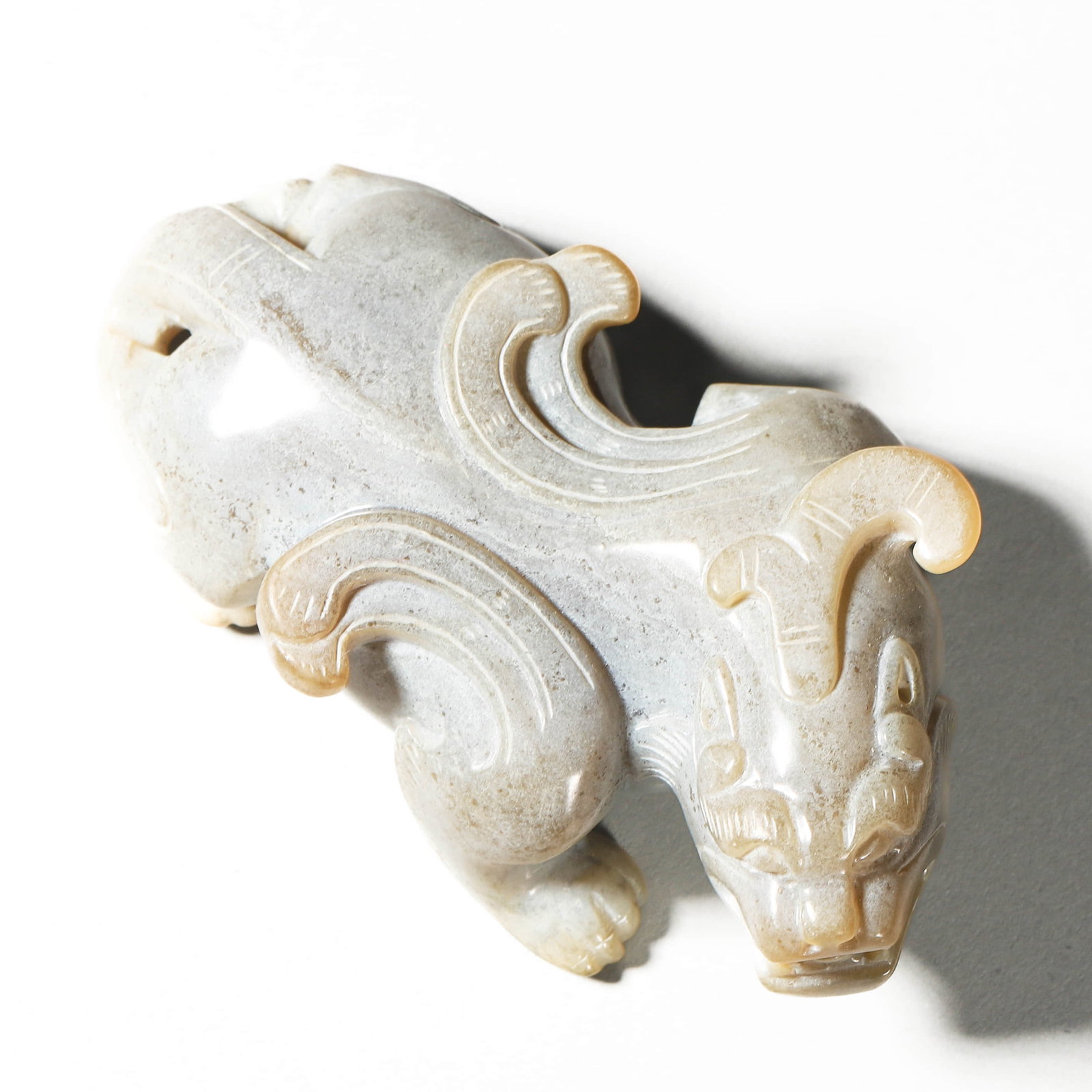 A JADE BEAST.: Length 3 3/4 in (9.5 cm); Width 2 3/16 in (5.5 cm)