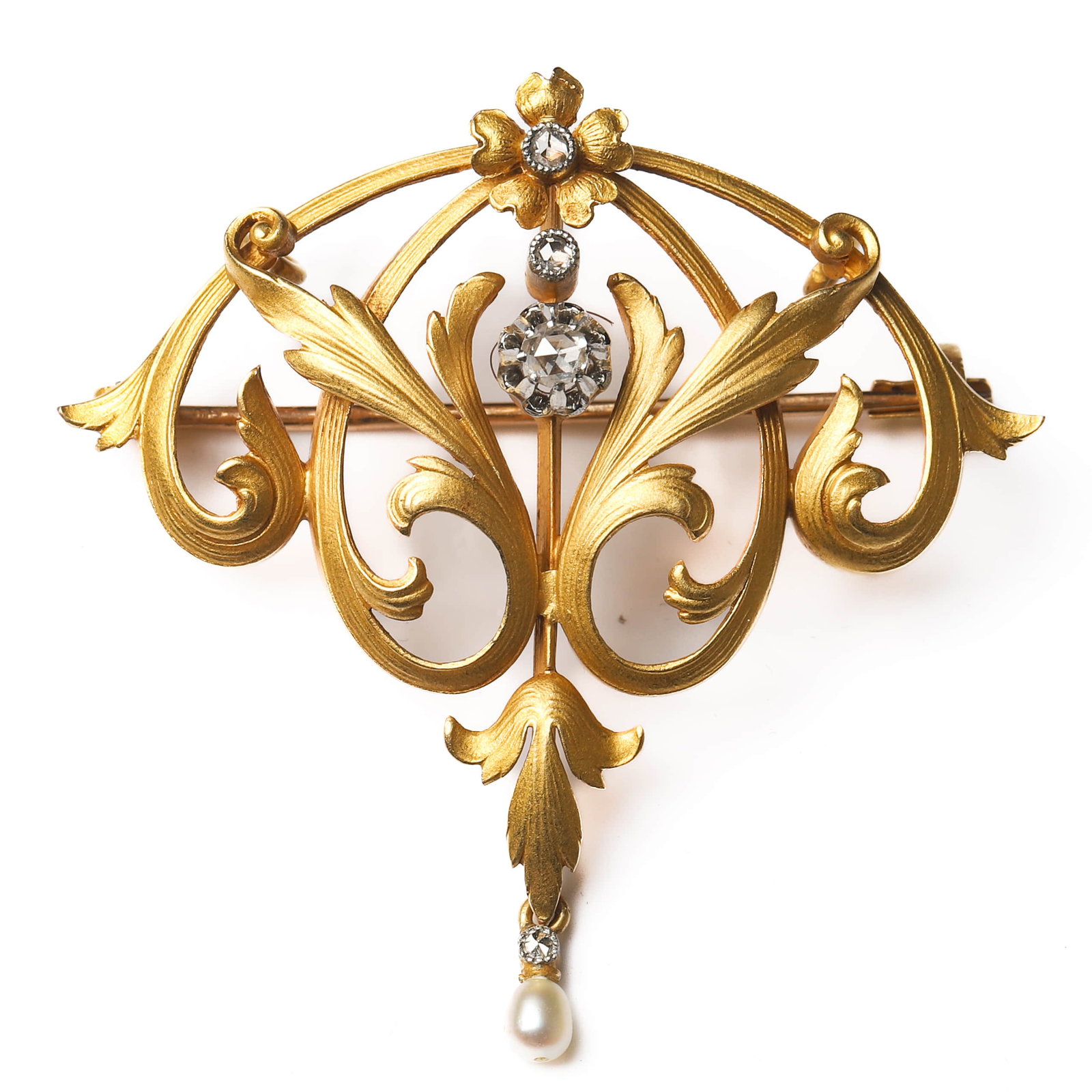 ART NOUVEAU (1880–1920), A FRENCH GOLD BROOCH-PENDANT WITH SCROLLING FLORAL MOTIFS, EAGLE HEAD: Dimensions 1 3/4 × 1 11/16 in. (44 × 43 mm); Weight: 8.3 g Description A finely crafted French brooch-pendant in 20K gold, featuring a high-relief design of scrolling floral motifs. The elegantly