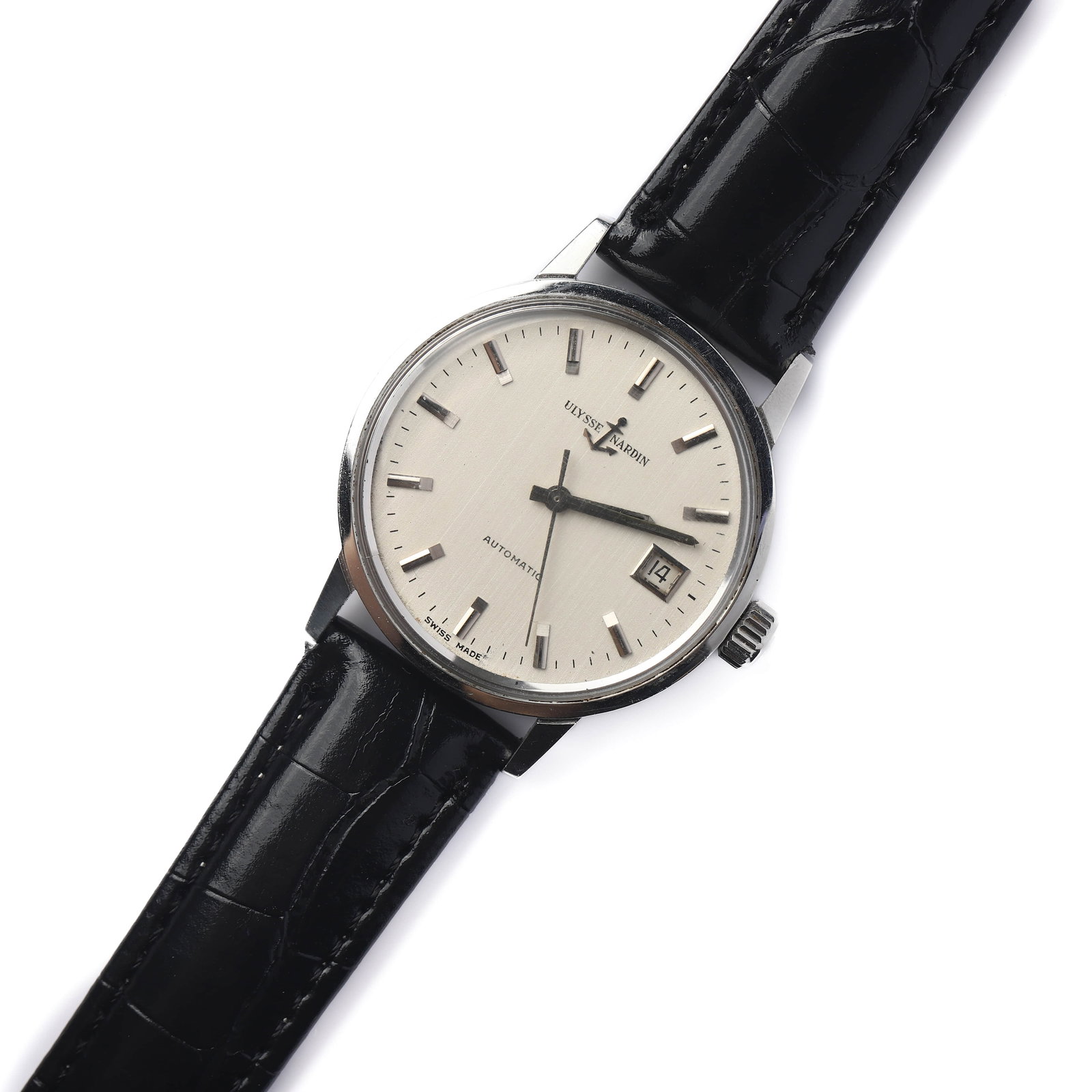 ULYSSE NARDIN AUTOMATIC DATE WRISTWATCH: Dimensions Length: 9 13/16 in (25 cm); Dial diameter: 1 1/2 in (38.3 mm) Description A classic Ulysse Nardin automatic wristwatch featuring a silvered dial with applied baton hour markers and central 