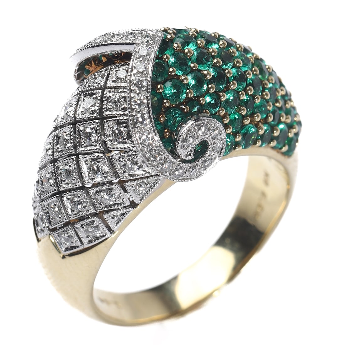 AN 18K TWO-TONE GOLD DIAMOND AND EMERALD RING: Dimensions Hong Kong size 20; weight approx. 18.3 g. Description A highly distinctive 18k two-tone gold ring of sculptural openwork design, combining yellow and white gold elements. The composition fe