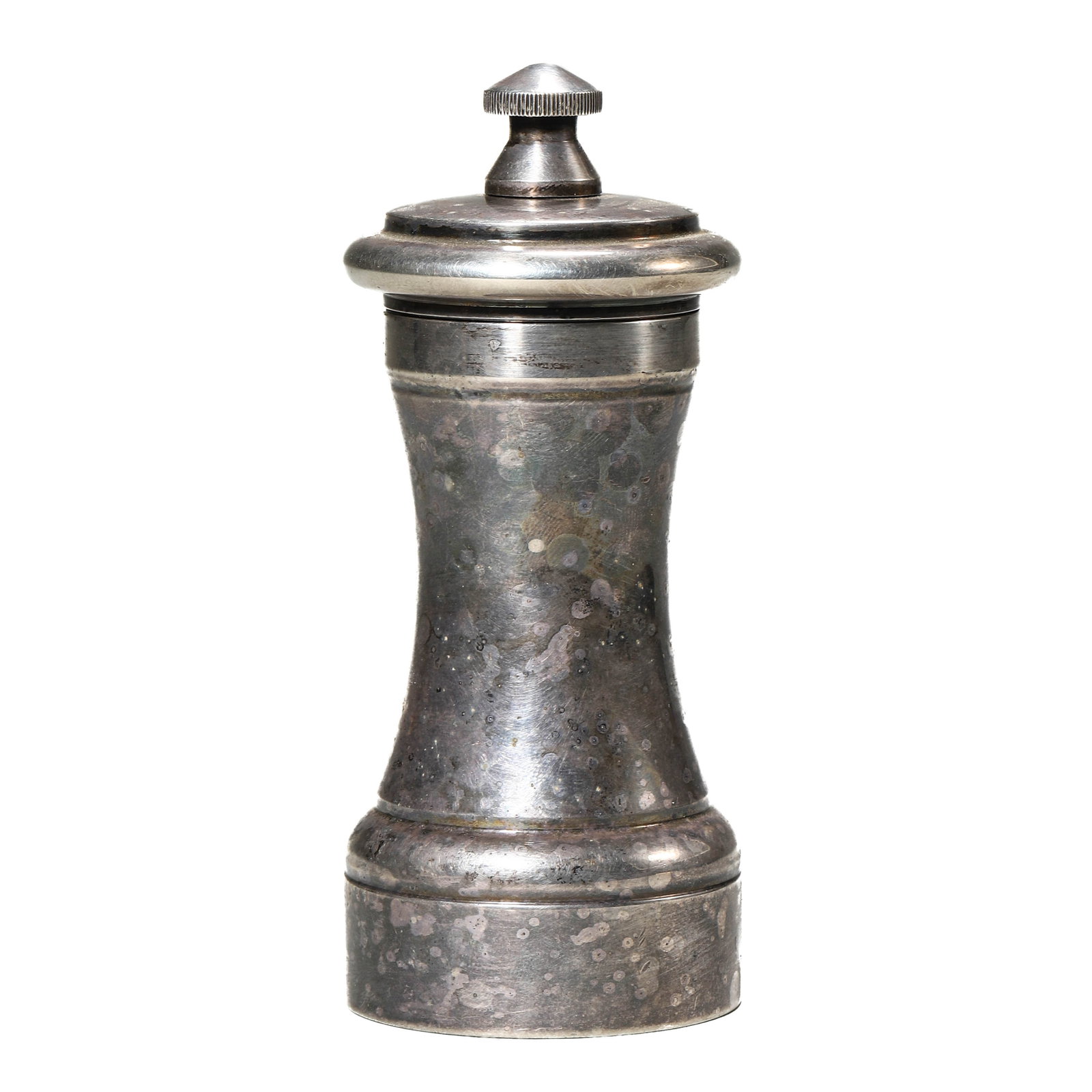 AN ITALIAN METAL PEPPER MILL, C.C., 20TH CENTURY.: Dimensions Height: 4 5/16 in. (11 cm) Description This compact pepper mill of turned metal form features a domed knob finial and a patinated surface with spotted oxidation consistent with age and use.