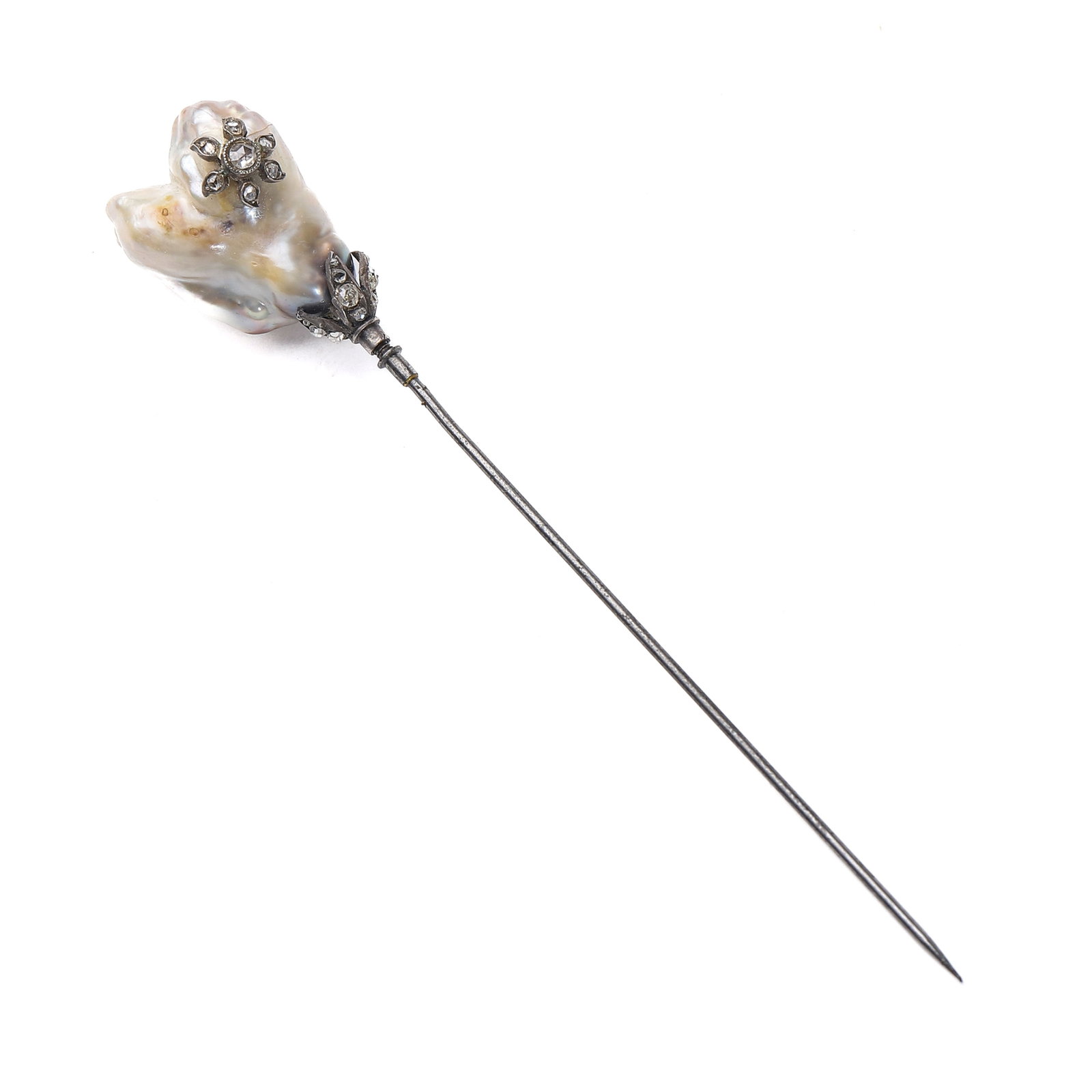 VICTORIAN ERA LARGE NATURAL PEARL HAT PIN: A Victorian-era (1837-1901) hat pin featuring a rare, large natural baroque pearl set with old-cut diamonds in silver. The pearl has a unique organic shape and is mounted on a steel pin. The