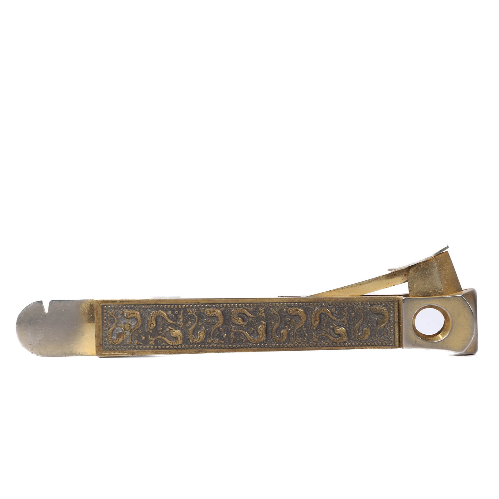 GILT METAL CIGAR CUTTER WITH DECORATIVE SCROLLWORK: Dimensions Length: 5 13/16 in (14.7 cm) Description A gilt metal cigar cutter decorated with a detailed band of scrolling motifs along the handle, the surface enriched with fine textured grounding