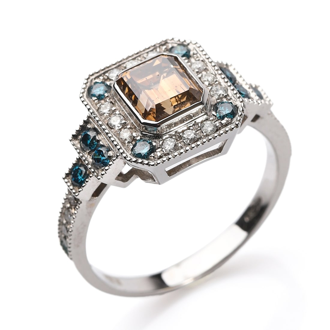 An 18K White Gold Gemstone and Diamond Ring: Dimensions Inner diameter approx. 17 mm; face length approx. 7 mm, width approx. 5.1 mmWeight: 3.9 g Description This elegant ring is finely crafted in 18K white gold (hallmarked "750"). At its