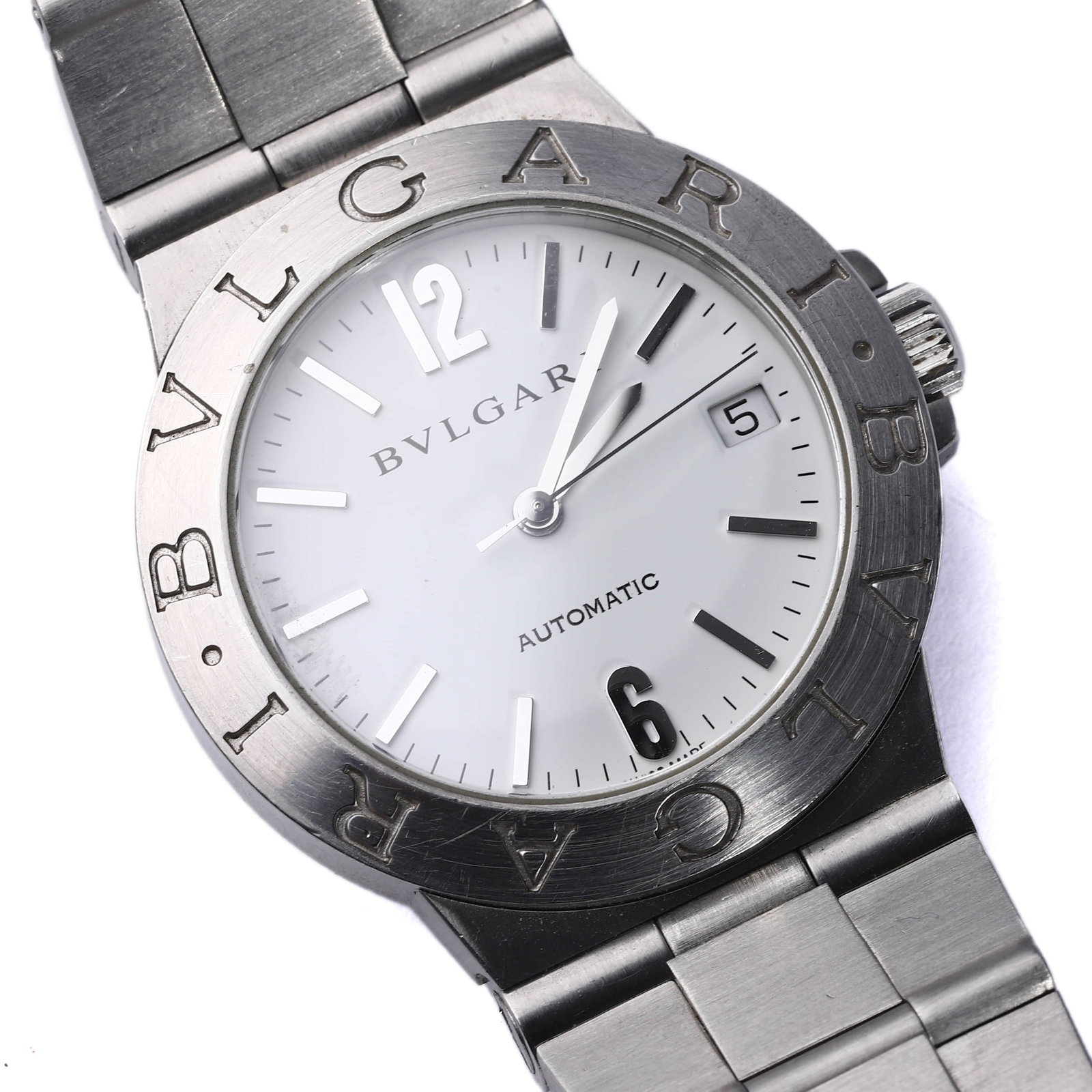 BVLGARI STAINLESS STEEL AUTOMATIC WRISTWATCH: Dimensions: Case diameter: 38.4 mm This BVLGARI wristwatch features a brushed stainless steel case and matching integrated bracelet, showcasing the brand's iconic double-logo bezel engraved with