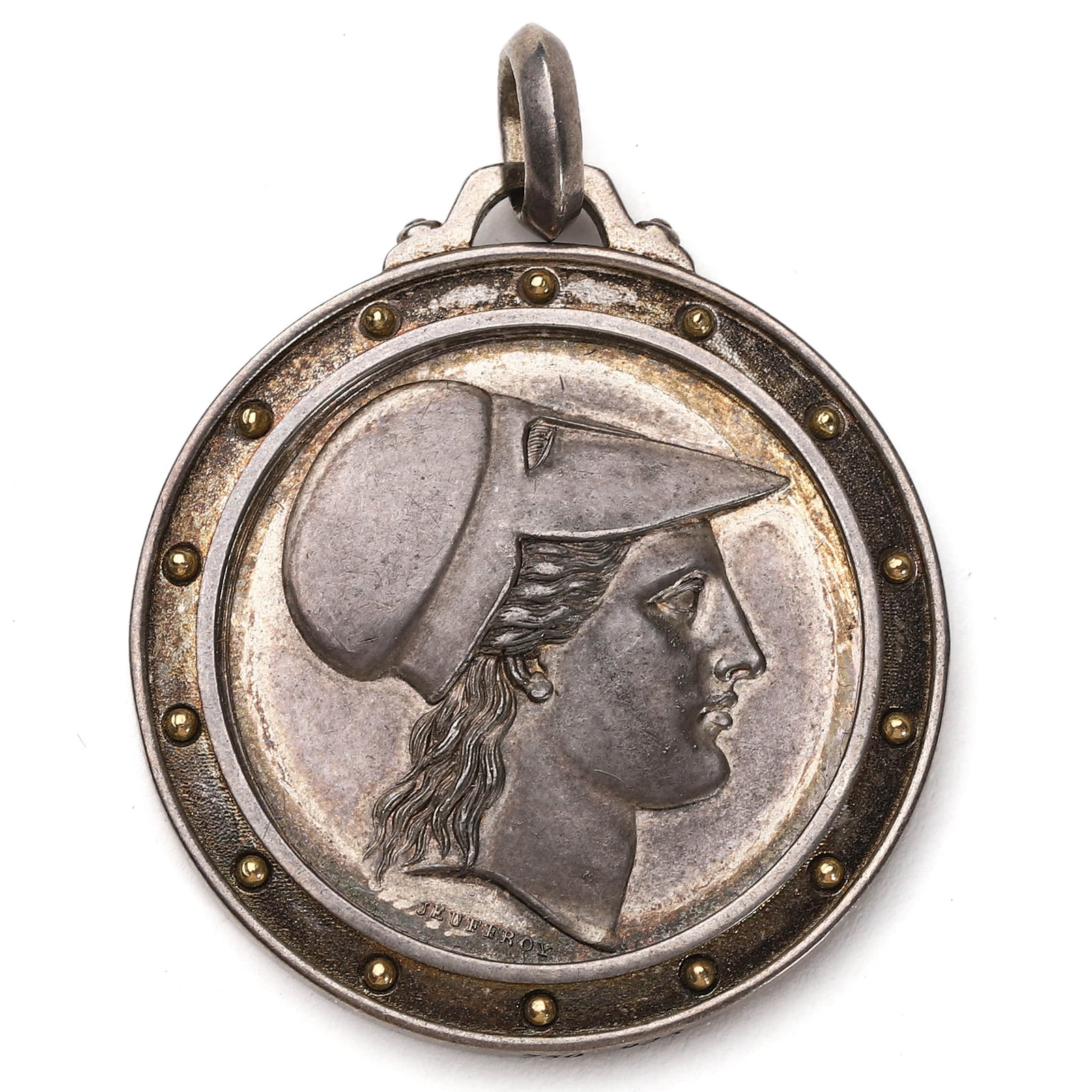FRENCH SILVER-GILT MEDAL OF THE SOCIÉTÉ LIBRE D'ÉMULATION, ROUEN: Dimensions: Diameter: 1 3/8 in. (35.5 mm); Weight: 16.8 g Description: A finely crafted French silver medal with a silver-gilt finish, designed with a classical male profile in relief on the obverse,