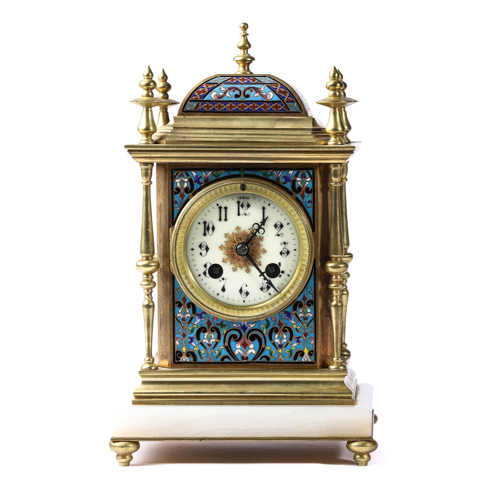 A CHINESE CLOISONNÉ ENAMEL AND GILT-BRONZE MANTEL CLOCK WITH KEY: Dimensions Height: 11 3/8 in (29 cm)Length: 6 11/16 in (17 cm)Width: 5 1/2 in (14 cm). Of rectangular form surmounted by a domed roof and four finials, the clock richly decorated with cloisonné ename