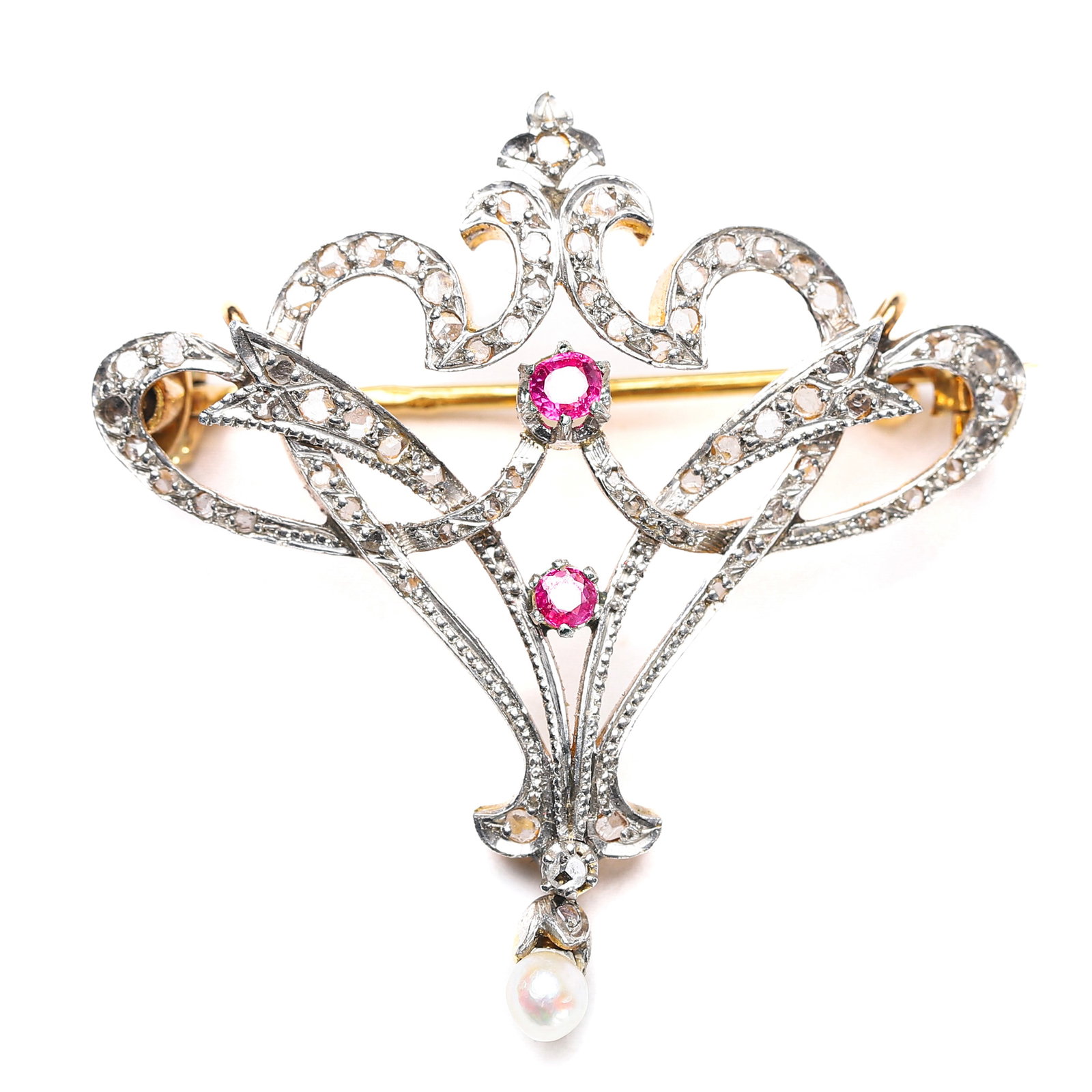 EDWARDIAN FRENCH 18K GOLD AND PLATINUM DIAMOND AND RUBY BROOCH PENDANT, 1901-1910.: Dimensions: 1 9/16 x 1 9/16 in (4 x 3.9 cm); Weight: 7.4 g; Period: 1901-1910.This elegant brooch pendant is crafted with an 18k gold base and topped with repoussé platinum, embodying the ethereal