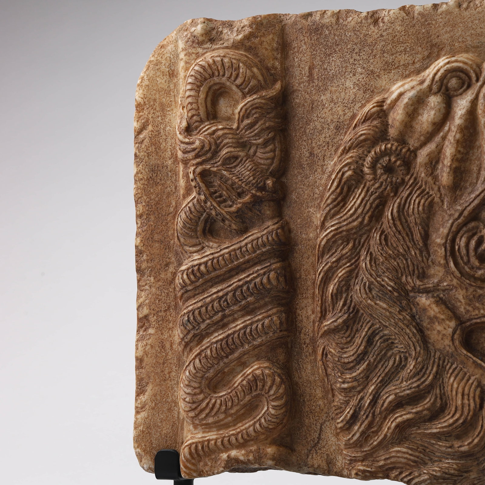 A CARVED STONE RELIEF PANEL - 3