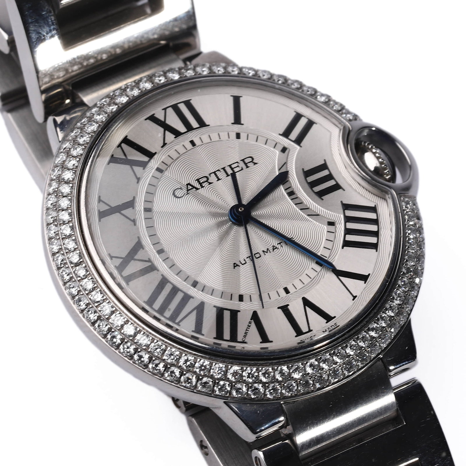 CARTIER BALLON BLEU STAINLESS STEEL DIAMOND-SET AUTOMATIC WRISTWATCH: Dimensions: Dial diameter approx. 1 1/2 in. (38.1 mm) Description: An elegant Cartier Ballon Bleu wristwatch crafted in stainless steel, featuring a round case adorned with a double row of pavé-set r