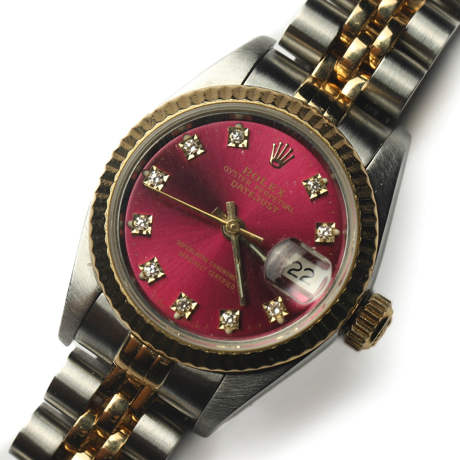 ROLEX LADY DATEJUST TWO-TONE STAINLESS STEEL AND GOLD WRISTWATCH WITH DIAMOND DIAL: Dimensions Case Diameter 1 1/8 in. (2.86 cm) Weight 51.4g Description A Rolex Lady Datejust automatic wristwatch featuring a two-tone stainless steel and yellow gold Jubilee bracelet, fluted yellow