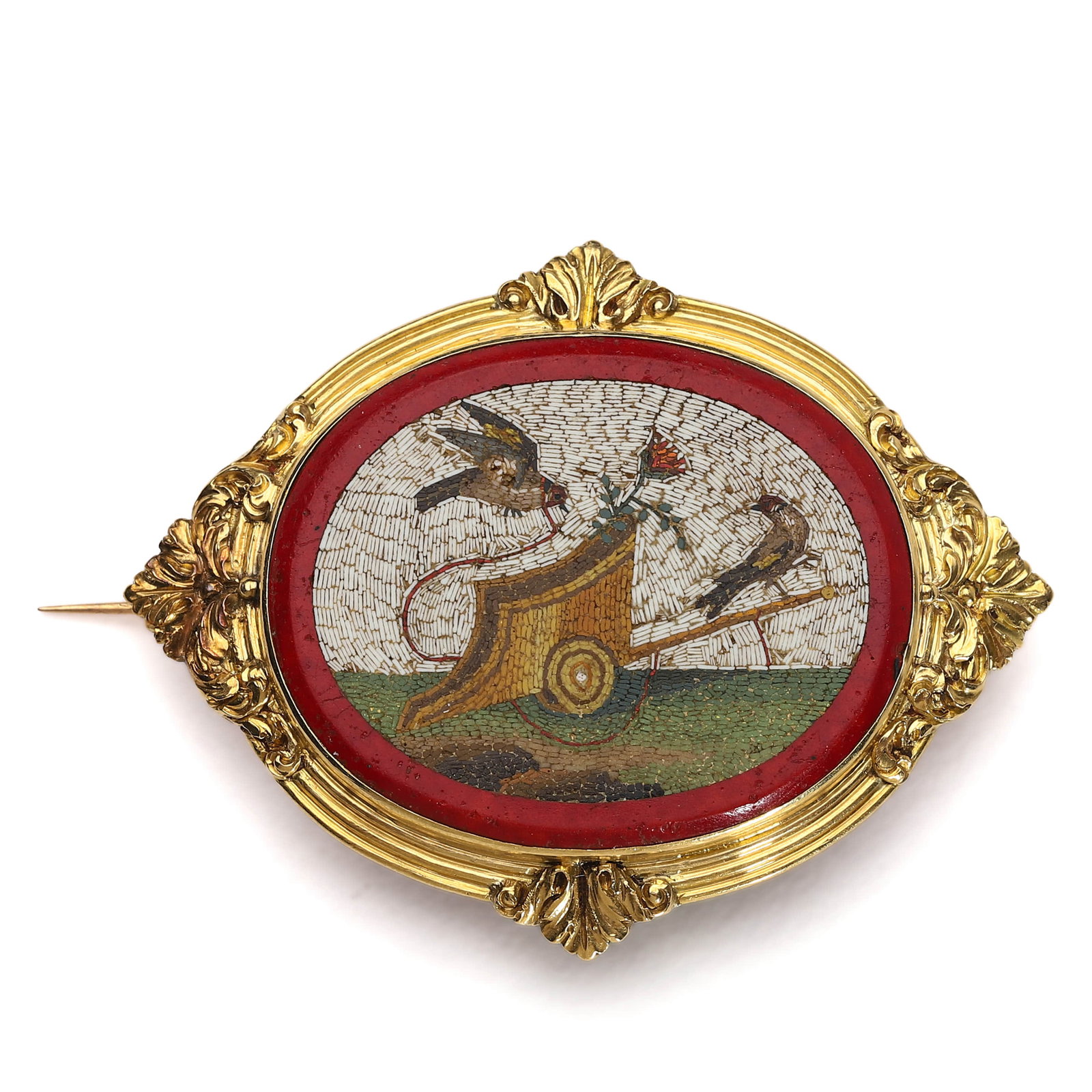 ITALIAN MICRO-MOSAIC GOLD BROOCH WITH BIRDS IN CHARIOT MOTIF: Dimensions: Length: 1 31/32 in. (50.2 mm); Width: 1 17/32 in. (39 mm); Weight: 10.5 g Description: A fine antique Italian micro-mosaic brooch featuring two birds drawing a small chariot, set against